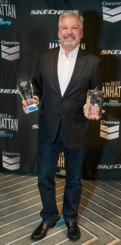 Best of Manhattan's inaugural Hall of Fame inductee Michael Greenberg with his honor and Skechers' "Pay It Forward" award. The Skechers president and his company have raised more than $30 million for causes in the South Bay and around the world. Photo credit: Brenda Cash Photography