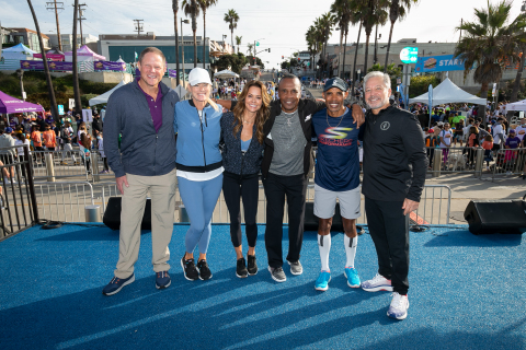 From left: Presenting sponsor Kinecta Federal Union CEO Keith Sultemeier, Skechers Foundation Executive Director Robin Curren, Brooke Burke, Sugar Ray Leonard, Meb Keflezighi and Skechers President Michael Greenberg kick off the 2021 Skechers Pier to Pier Friendship Walk in Manhattan Beach, CA. (Photo: Business Wire)