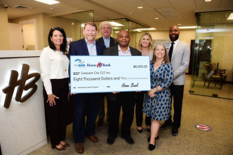 Home Bank, the Federal Home Loan Bank of Dallas and Crescent City Community Land Trust officials celebrate the awarding of $8,000 in Partnership Grant Program funds. (Photo: Business Wire)