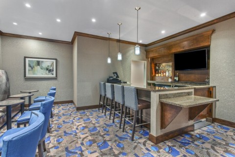 Relax at the intimate lobby bar in the evenings; rise and dine at the morning breakfast bar. (Photo: Business Wire)