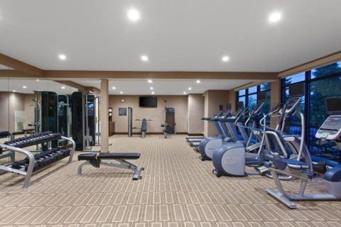 Stretch it out on state-of-the-art fitness equipment, including ellipticals and treadmills. (Photo: Business Wire)