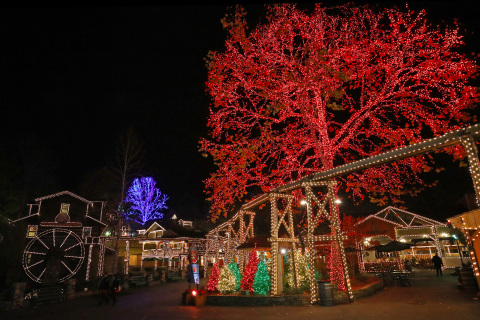original Dollywood guests can enjoy more than five million lights, delectable culinary creations, award-winning entertainment and the park's world-class attractions during Smoky Mountain Christmas presented by Humana (Nov. 6- Jan. 2, 2022). (Photo: Business Wire)