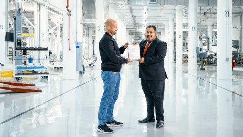 Matt Tall, VP of Manufacturing for Faraday Future receives the Certificate of Occupancy for the major manufacturing area of its Hanford, Calif. manufacturing plant, delivered personally by Francisco Ramirez, Mayor of Hanford. (Photo: Business Wire)
