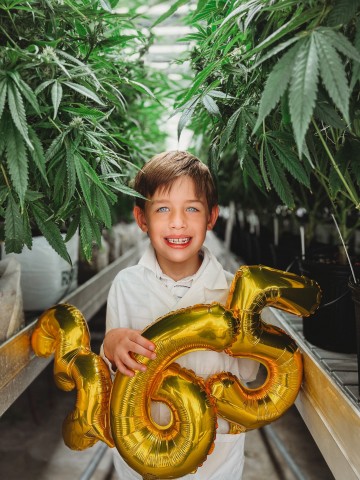 Jacob Ortiz reached his one year anniversary free from seizures with the help of medical cannabis. The 7-year-old visited Texas Original Compassionate Cultivation’s facility in Austin, Texas to mark the occasion. (Photo courtesy of Kaleigh Koch)