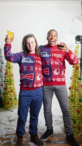 The Franzia holiday merchandise collection includes a limited-edition collaboration sweater between Budweiser and Franzia that toasts to Buds and Franz. (Photo: Business Wire)