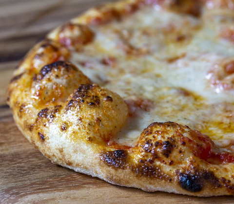 Pizza with New Culture animal-free mozzarella (Photo: Business Wire)