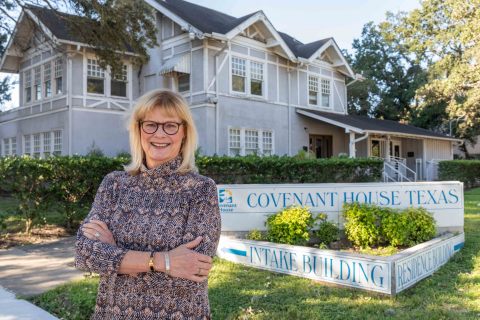 Covenant House Texas Executive Director Leslie Bourne stands in front of the organization’s aging campus after receiving a $750,000 Affordable Housing Program subsidy from Texas Capital Bank and FHLB Dallas. (Photo: Business Wire)