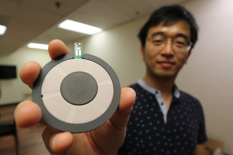 Resonant Link Co-Founder Dr. Phyo Aung Kaw, a Forbes 30 under 30 winner, holds up a Multi-Surface Resonant Structure wireless charging coil. The coils are capable of high performance wireless power transfer in medical devices, consumer electronics, robotics, and electric vehicles. Resonant Link has been selected for the Shell/NREL Gamechanger program to help accelerate the groundbreaking technologies commercialization. (Photo: Business Wire)