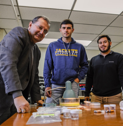 HPU’s Dr. Martin Mintchev, left, and students Jayden Modrall and Rylee McGee have developed a laboratory project to grow tardigrades, microscopic animals to be cultivated as a potential food source. (Photo: Business Wire)