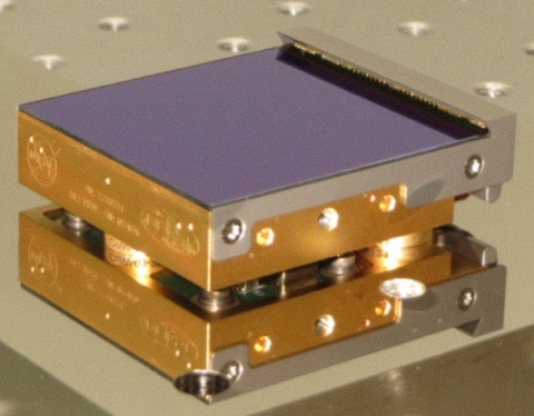 The 16.7 million pixel H4RG-10 sensor chip assembly (SCA) is shown in the photo. Image credit:  NASA / Goddard Spaceflight Center