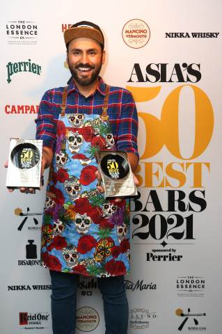 Jay Khan, bartender and co-founder of COA, poses for photos after the announcement that the bar was ranked No.7 in the World’s 50 Best Bars 2021 List and was named The Best Bar in Asia (Photo: Business Wire)