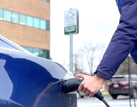 Catalyze CFO and Co-Founder James Geshwiler connects his electric vehicle to a charging station. Catalyze and MGL will provide a turnkey fleet electrification solution for commercial, industrial and municipal customers across the U.S. (Photo: Business Wire)