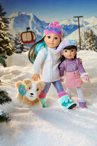 American Girl's 2022 Girl of the Year, Corinne Tan, whose Aspen-set storyline centers on family, including her little sister, Gwynn, and new puppy. (Photo: Business Wire)