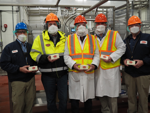 original Leaders at Darigold’s production facility in Caldwell, Idaho, Jeffrey Simons (far left), Rob Tiberino (second from left) and Troy Brown (far right), join the co-op’s Vice Chairman Tony Freeman (center) and Caldwell Mayor Jerom Wagoner (second from right) to celebrate resumption of partial operations at the plant after an October fire forced its closure. (Photo: Business Wire)