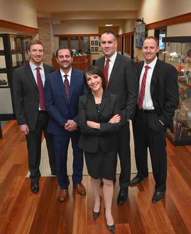 Photo of five members of Penn Wealth Planning, a wealth management practice that joined the independent channel of Ameriprise Financial, in their office in New Hope, Pennsylvania. The team is led by Lisa Policare, MBA, CEO, pictured in the center. Photo courtesy of Penn Wealth Planning.