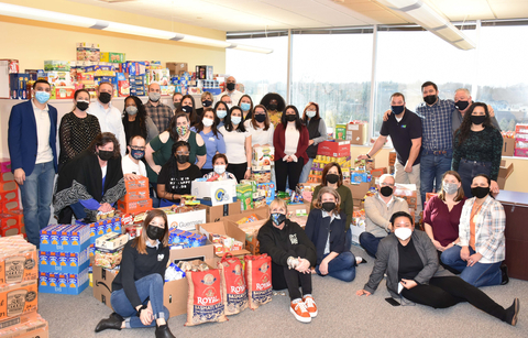original Northwest employees with the Souper Bowl's 12K+ donations (Photo: Business Wire)