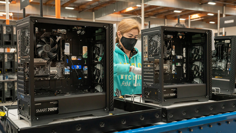 A BuildENIAC employee installs components in a high-end gaming PC. (Photo: Business Wire)