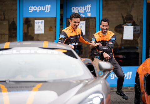 Lando Norris and Daniel Ricciardo racing to their cars to surprise McLaren superfans with a once-in-a-lifetime delivery from Gopuff in celebration of the new global partnership between Gopuff and McLaren's Formula 1 Team. (Photo credit: PinPep.) 