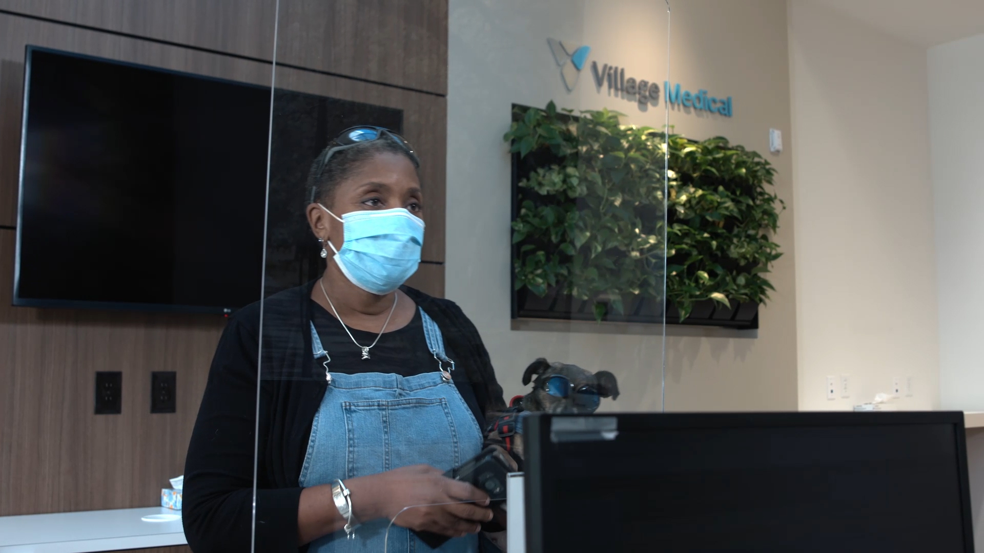 B-roll footage: 1.) External and internal footage of a Village Medical at Walgreens primary care practice alongside a Walgreens pharmacy; 2.) Patient with Village Medical and Walgreens integrated care team