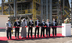 Halliburton formally opens its chemical reaction plant with a ribbon cutting including: Saudi Aramco Vice President of Unconventional Resources, Khalid Al-Abdulqader; Saudi Aramco Vice President of Procurement and Supply Chain Management, Mohammad Al Shammary; Royal Commission CEO, Dr. Ahmed Al-Hussain; Halliburton Chairman, President and CEO, Jeff Miller; Saudi Aramco Senior Vice President of Upstream, Nasir Al-Naimi; Sadara Chemical Company CEO, Dr. Faisal Al-Faqeer; Saudi Aramco Executive Director of Petroleum Engineering & Development, Waleed Al-Mulhim; Saudi Aramco Vice President of Drilling & Workover AbdulHameed Al-Rushaid. (Photo: Business Wire)