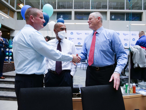 Granite CEO Rob Hale (left) and Boston Children's Hospital President and CEO Kevin Churchwell (center) welcome Massachusetts Governor Charles Duane Baker Jr. to Granite's 9th Annual "Saving by Shaving" event to benefit Boston Children's. Photo courtesy of Granite Telecommunications.