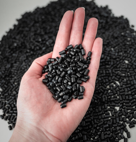 NewRoad® dry asphalt additive is made of recycled plastic. The product was developed with performance in mind, but also has the advantages of keeping plastic out of the environment and reducing carbon emissions when compared with oil-based polymer additives. (Photo: Business Wire)