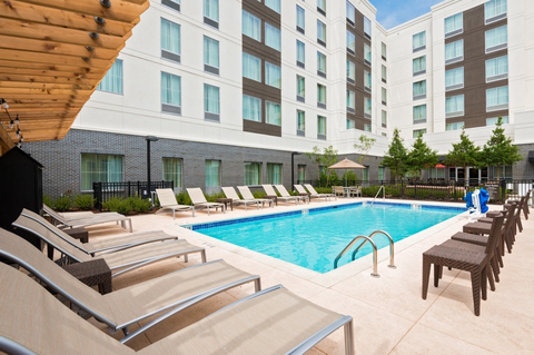 Lounge by the outdoor pool — Arkansas’s humid subtropical climate provides year-round sun! (Photo: Business Wire)