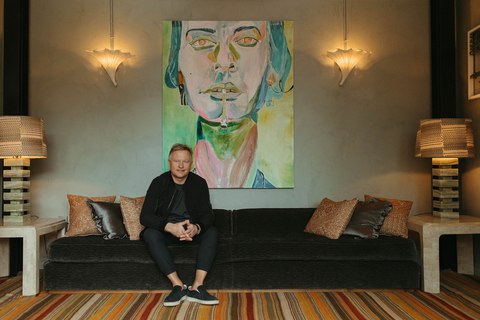 Soho House Founder and CEO, Nick Jones sits in the entrance of the newly-opened Soho House Nashville. The House displays 170 pieces of artwork from local 41 Nashville and Tennessean artists. Art by John Paul Kesling. (Photo: Business Wire)