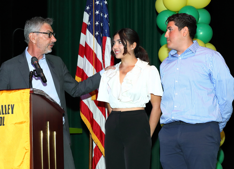 Jean-Yves Fillion, CEO of BNP Paribas USA (L), congratulates scholarship award recipients Lydia Rodriguez (C) and Fernando Ruiz-Chavez (R) at Coachella Valley High School on Wednesday. Photographer: Marc Glassman/Marc Glassman Photography