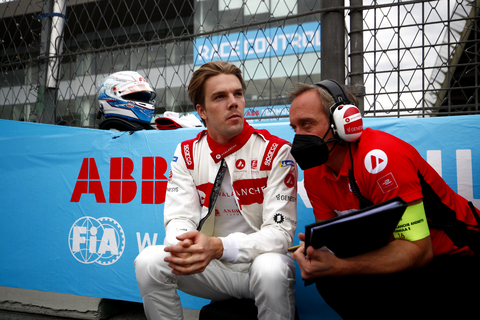 Oliver Askew (USA), Avalanche Andretti, suited up and on the grid with an engineer. (Photo: Business Wire)