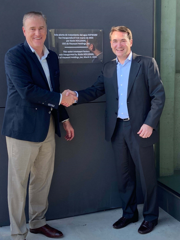 Hayward CEO Kevin Holleran, left, shakes hands with Fernando Blasco, Vice President and General Manager for Europe Rest of World, at a ceremony celebrating the opening of the company's new facility in Barcelona, Spain. (Photo: Business Wire)