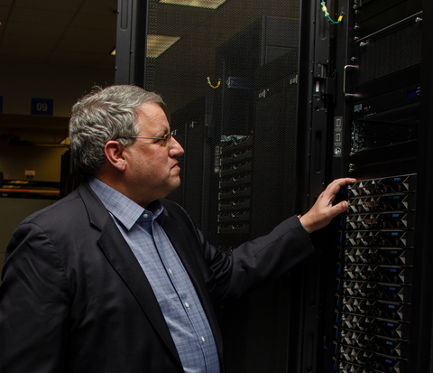 original Lonestar6 - Front View - TACC Executive Director Dan Stanzione with GigaIO JBOG and GigaIO network switch above Dell Servers with AMD's EPYC Milan processor. ©Jorge Salazar, TACC