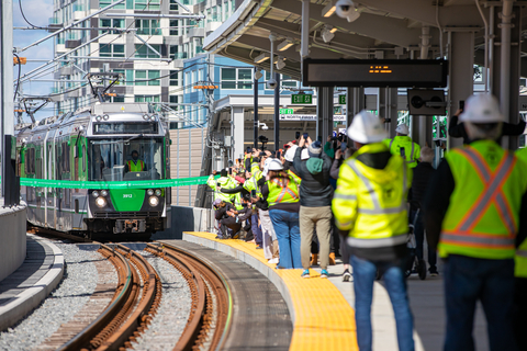 Community partners, including the Fluor-led joint venture, mark the opening of the first branch of the Green Line Extension (GLX) Project connecting Cambridge and the City of Somerville with rail service. (Photo: Business Wire)