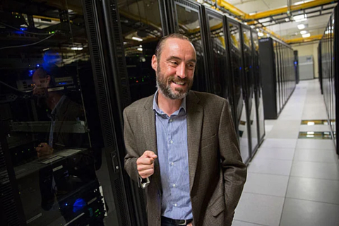 original Dr. James Cuff, former assistant dean and distinguished engineer for research computing, Harvard University, pictured on site with the Odyssey computing cluster. ©Kris Snibbe/Harvard Staff Photographer.