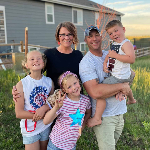 Scholarship recipient, Holly F. of Peyton, Colorado, pictured with her family. Holly will utilize the funds to pay for course material to advance her lactation education. She joins 24 other military spouses who were each awarded one of NMFA’s 2021 Spouse Scholarships, a program supported by Corvias Foundation for the past seven years. (Photo: Business Wire)