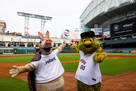 Reliant mascot, Hugo, and Houston Astros mascot, Orbit, join together to announce Reliant as the Official Energy Provider of the Houston Astros. (Photo: Business Wire)
