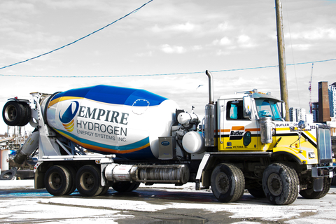 Butler Concrete and Aggregate celebrates the installation of a fuel enhancement system with a new concrete drum wrap design in collaboration with Empire Hydrogen Energy Systems Inc. The fuel enhancement system reduces carbon emissions during the transportation of concrete. (Photo: Business Wire)