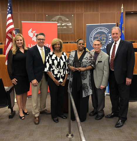 Pictured at the April 19 event, left to right, Lauri Perdue, campus & academic director of University of Phoenix, North Las Vegas City Councilman Scott Black, North Las Vegas City Councilwoman Pamela Goynes-Brown, scholarship recipient LaGeisha Espy, Mayor Pro Tem Richard Cherchio, and Mayor John Lee. (Photo: Business Wire)