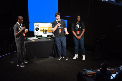 (L-R) Students Donovan Carter, Darren Labbe and Camille Kersha-Aerga of Great Bridge High School in Chesapeake, Virginia present their STEM project to address bus driver shortages to judges at the Samsung Solve for Tomorrow National Finalist Pitch Event on Monday, April 25, 2022 in New York City at Samsung 837. Credit: SAMSUNG