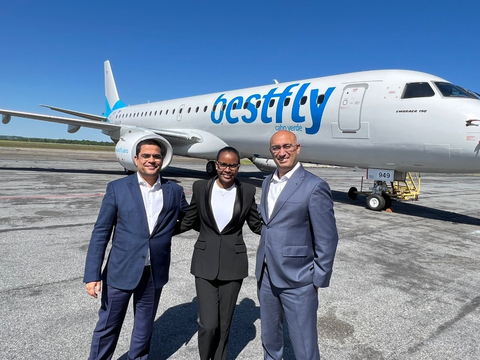 original Nuno Pereira, Chief Executive Officer of Bestfly, Alcinda Pereira, Executive Director of Bestfly, and Sameer Adam, Senior Vice President, Commercial of ACIA Aero Leasing, pictured in front of the first E-190 aircraft delivered to Bestfly at Embraer’s re-delivery center in Macon, Georgia. (Photo: Business Wire)