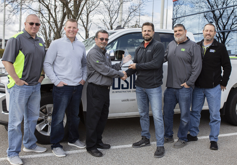 original L to R: USIC Operations Excellence Supervisor Corie Lovell, CNP Senior Damage Prevention Coordinator Rusty Poore, CNP Manager of Damage Prevention/Vendor Development Troy Carson, USIC State Director Michael Burgett, USIC District Manager John Stevens, USIC Field Manager Michael Harris (Photo: Business Wire)