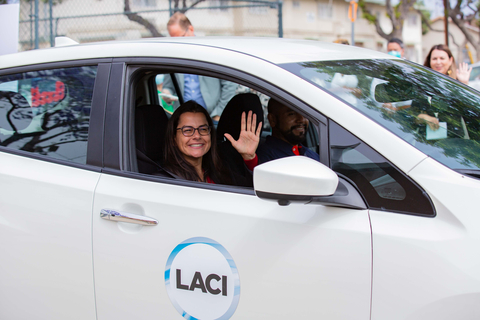 Congresswoman Nanette Díaz Barragán (CA-44) riding with Rancho San Pedro resident Ruben Acre in one of the LACI EV Car Share Nissan Leaf vehicles powered by Envoy. (Photo: Business Wire)