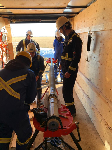 RocketFrac personnel readying their patent-pending tool for deployment at a well site. (Photo: Business Wire)