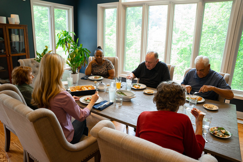 Residents at Rosette gather in the dining room to enjoy a home-cooked meal. (Photo: Business Wire)