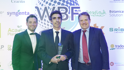 Botanical Solution Inc. (BSI) Senior VP for Latin America, Diego Ibañez (Center), receives the Best Biotech Startup Company of the Year Award from the World BioProtection Forum. (Photo: Business Wire)