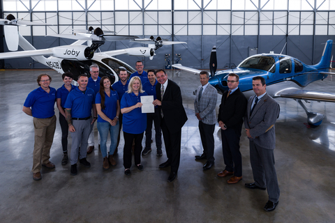 Joby’s air operations team pictured receiving the company’s Part 135 Air Carrier Certificate from the FAA’s San Jose Flight Standards District Office. (Photo: Business Wire)