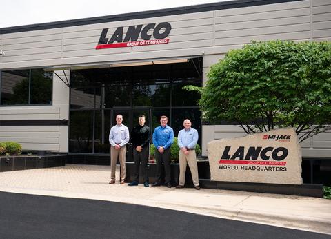 Mi-Jack Products acquires Yardeye GmbH. Executives from both companies stand in front of the Mi-Jack/Lanco world headquarters in Homewood, IL on May 31st, 2022. L-R: Jack Wepfer, VP of Finance and Accounting for Mi-Jack/Lanco, Stephan Trauth, Managing Director of Yardeye, Aaron Newton, VP of Sales for Mi-Jack, and Simon Fiera, VP of Technology for Mi-Jack.