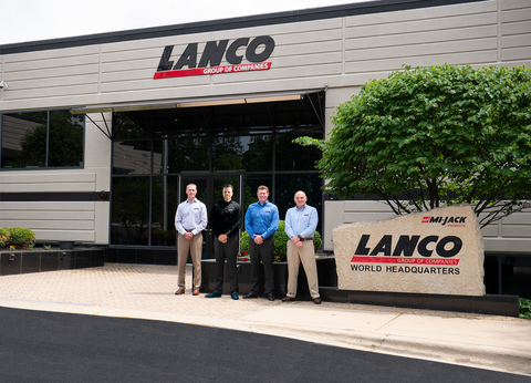 thumbnail Mi-Jack Products acquires Yardeye GmbH. Executives from both companies stand in front of the Mi-Jack/Lanco world headquarters in Homewood, IL on May 31st, 2022. L-R: Jack Wepfer, VP of Finance and Accounting for Mi-Jack/Lanco, Stephan Trauth, Managing Director of Yardeye, Aaron Newton, VP of Sales for Mi-Jack, and Simon Fiera, VP of Technology for Mi-Jack.