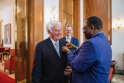 H.E. President of Senegal Macky Sall awards Mercy Ships Founder Don Stephens with Senegal's highest honor, the rank of Commander of the National Order of the Lion of Senegal. The Order of the Lion is reserved for only the most distinguished civil or military service. (Photo: Business Wire)