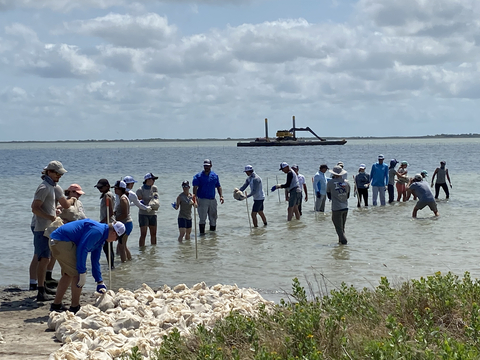 Yamaha Rightwaters recently joined forces with Texas A&M University-Corpus Christi’s® Harte Research Institute and the Coastal Conservation Association (CCA®) to initiate a new conservation project designed to evaluate the role of oyster reefs in capturing and storing carbon in St. Charles Bay in the Gulf of Mexico. On May 17, 25 volunteers representing Yamaha Rightwaters, CCA and the Harte Research Institute met at Goose Island State Park to place roughly 3,500 pounds of recycled oyster shells back into St. Charles Bay to help restore degraded oyster habitat. (Photo: Business Wire)